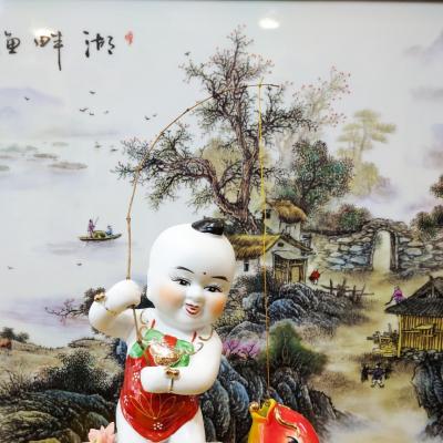 Tượng Em Bé Câu Cá